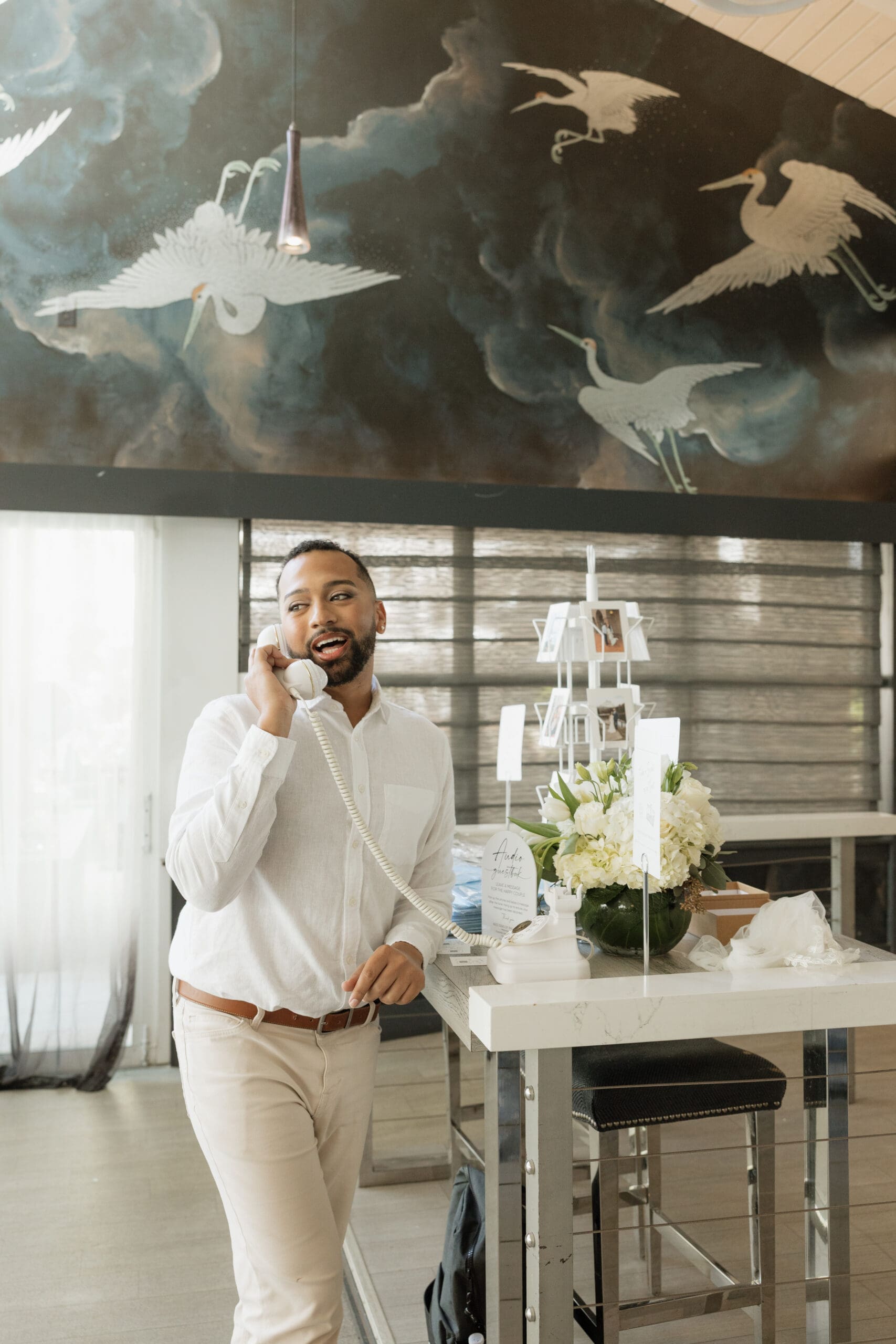 Wedding guest leaving message on audio guestbook phone Fort Lauderdale