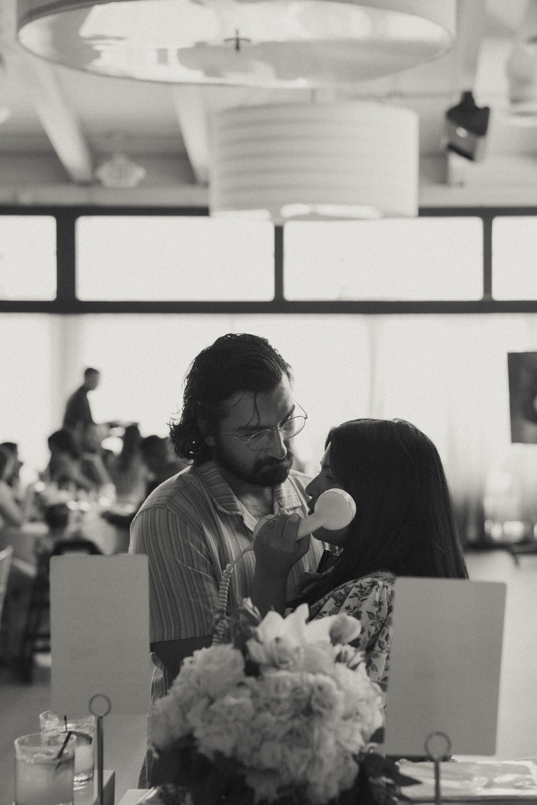 Wedding guest leaving message on audio guestbook phone Fort Lauderdale